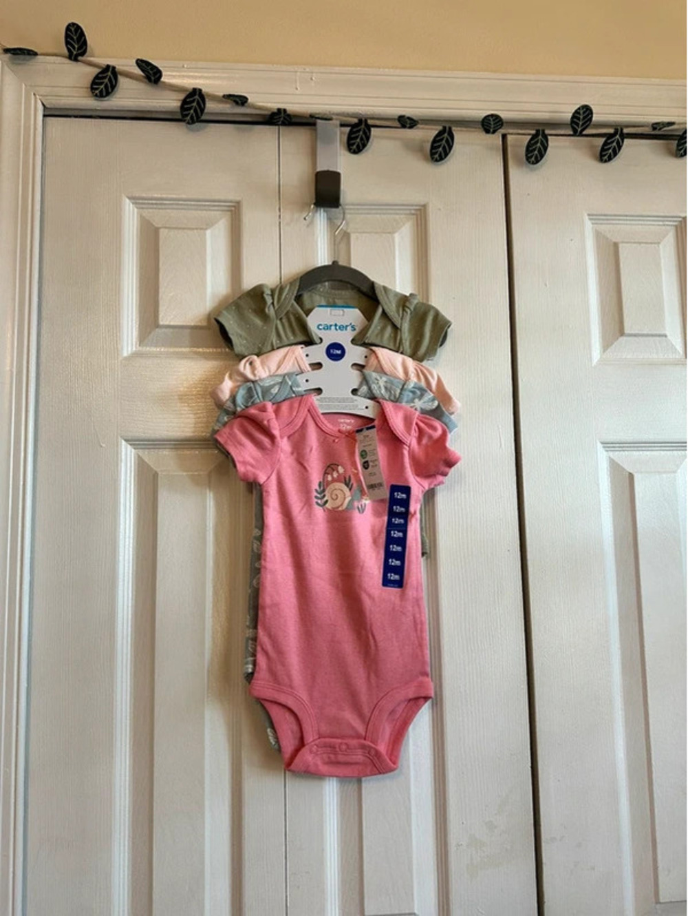 Carterโs onesies - 4 pack. Size 12 months.